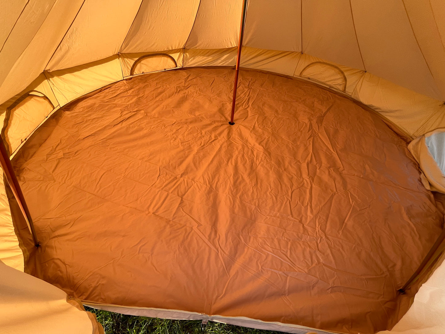 Birds eye view inside 5m bell tent. Taken with a wide angle lens.