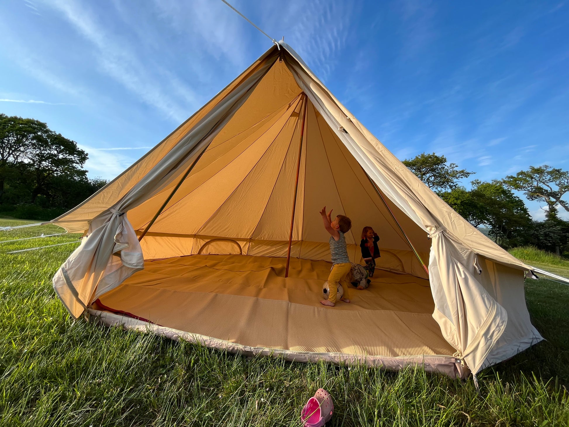 5m Bell Tent with open door, plus matting on top of the ground sheet. Taken with wide angle lens